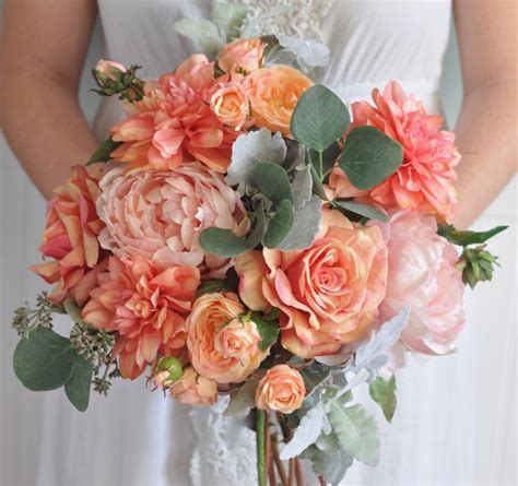 Coral bouquets match perfectly with bride's in ivory gowns. Coral Bouquet Wedding FlowersBohoWedding Bouquet Silk ...