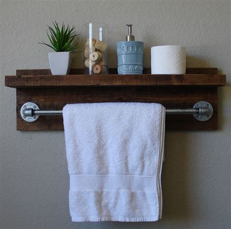 This rustic floating shelf is designed to bring a rustic element to any room. Modern Rustic Bathroom Shelf with 24" Brushed Nickel ...