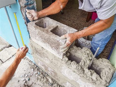 If the hole is smaller than 1 ⁄ 2 in (1.3 cm), you can quickly fill in the hole with some caulk to just keep things simple. How to Fill Holes in a Cinder Block Wall | Cinder block ...