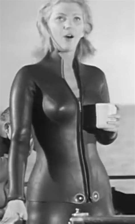 Hd00:14sportsman doing arm rotates to warm up before exercising on seashore at sunrise. Pin on Vintage Wetsuit Women