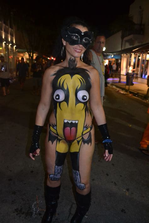 'that one too' refers to 'their language'. Key West 2014 Fantasy Fest | body art | Bodypainting und Kunst