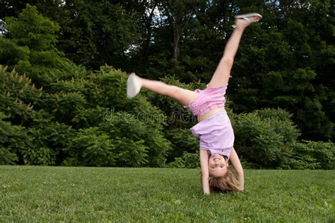 Think about going 1,2,3,4, or hand, hand, foot, foot. Little Girl Doing A Cartwheel Royalty Free Stock Images ...