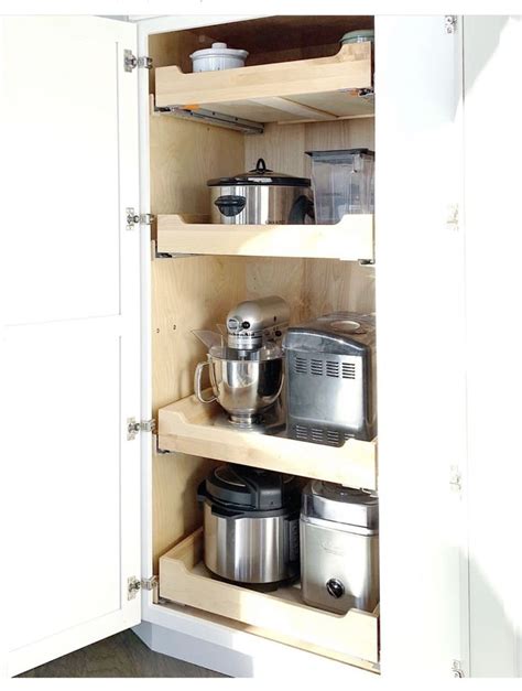 A level surface on a cabinet or display case, as in a kitchen or department store. Slid out appliance cabinet | Kitchen devices, Kitchen ...