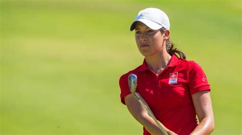 Albane valenzuela, of switzerland, laughs with her brother and caddy, alexis valenzuela, on the 11th fairway during a practice round prior to the women's golf event at the 2020 summer olympics. Río 2016Golf: Albane Valenzuela, la olímpica perfecta