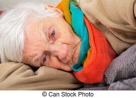 Find photos of old woman. Lady relaxing on the couch.