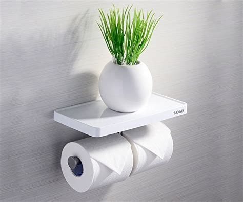 This rustic toilet paper holder has a simple design, made of recycled wooden panels. 40 Cool & Unique Toilet Paper Holders