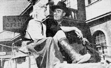 He lives in new england—just above a dam. Lucille Norman and Randolph Scott take a break from ...