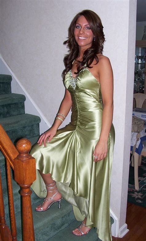 Young woman with hand on her stomach. Pin by Mike G. on Satin Clothed | Pinterest