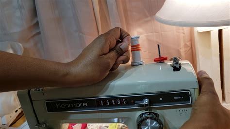 Let's see what the dictionary. Thread a bobbin on the Kenmore 1941 ZigZag Sewing Machine ...