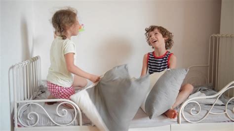 A jumping jack doesn't take. The Brother And The Sister Have Arranged Fight By Pillows ...
