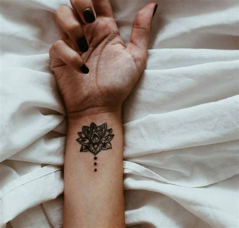 Tattoos on wrist for women. Mandala Wrist Tattoo Designs, Ideas and Meaning | Tattoos ...