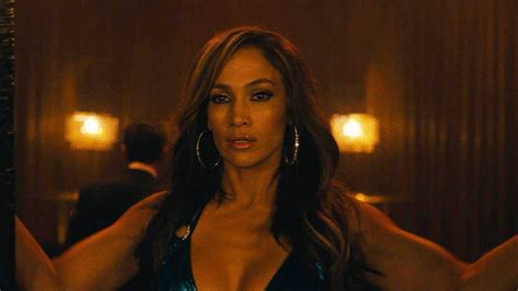 Jennifer dons an all black ensemble for the scene.pictured: Jennifer Lopez Reacts to 'Hustlers' Oscar Buzz | IndieWire