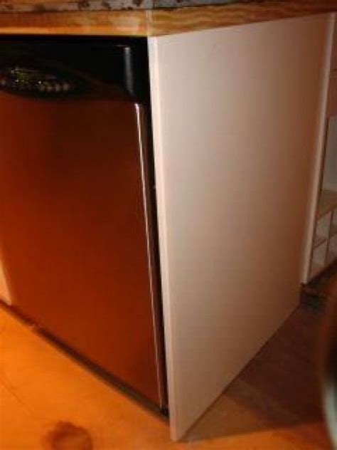 Attaching it with screws is a better method. dishwasher at end of cabinet run 30" x 40" cover panel not a standard base cabinet cover panel # ...