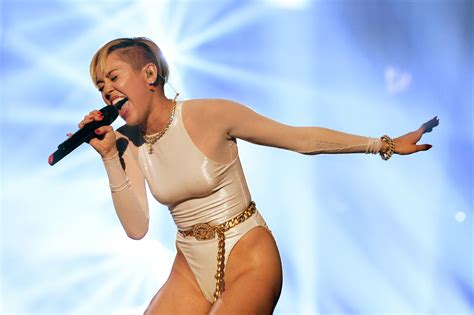 ↑ miley cyrus breaks silence on rootsy new music, fiance liam hemsworth & america: Top 10 Miley Cyrus Songs of All Time