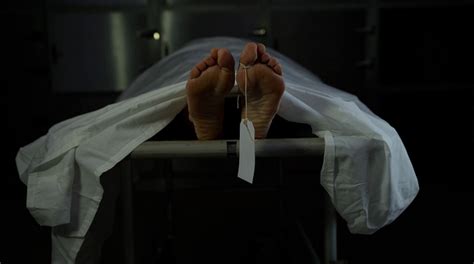 Her dead soles can be seen at 1:17 of the video. Ritual murder victim in morgue 1 year later - Nehanda Radio