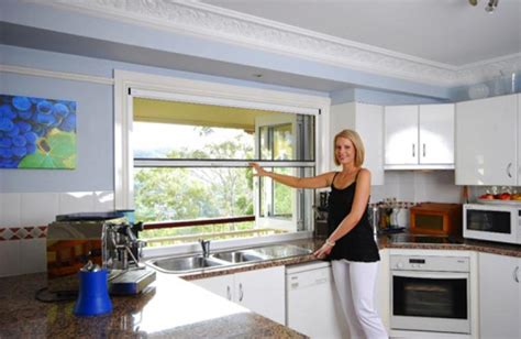 The bi fold window has a maximum opening size of 2.4m wide (per sash) and 1.5m high. Fly Screens Retractable Vertical Pull Down Prahran Melbourne