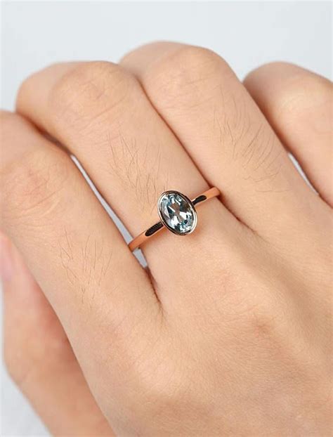 Free shipping on orders over $25 shipped by amazon. Aquamarine ring rose gold Minimalist Oval | Joias