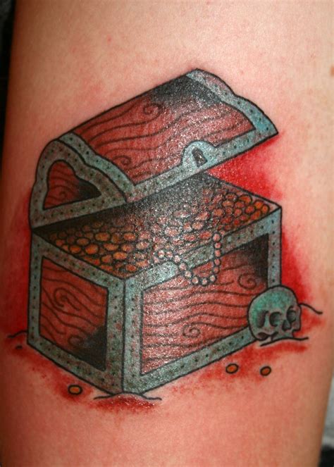 A black swan tattoo can symbolize man different things. treasure chest tattoo - want something like this added to ...