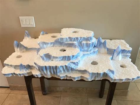 He really got into the button sand sequins too! Styrofoam Display Christmas Village Platforms in 2020 ...