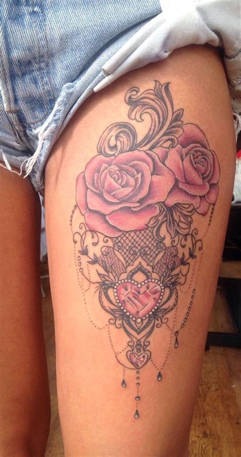 This tattoo displays thin chains on the rose, which represent strong bonds of the marriage. 1001+ ideas for thigh tattoos for women who are the ...