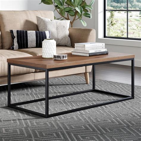 The coffee table assembles easily and quickly. Nathan James Doxa Dark Walnut with Matte Black Metal Frame ...