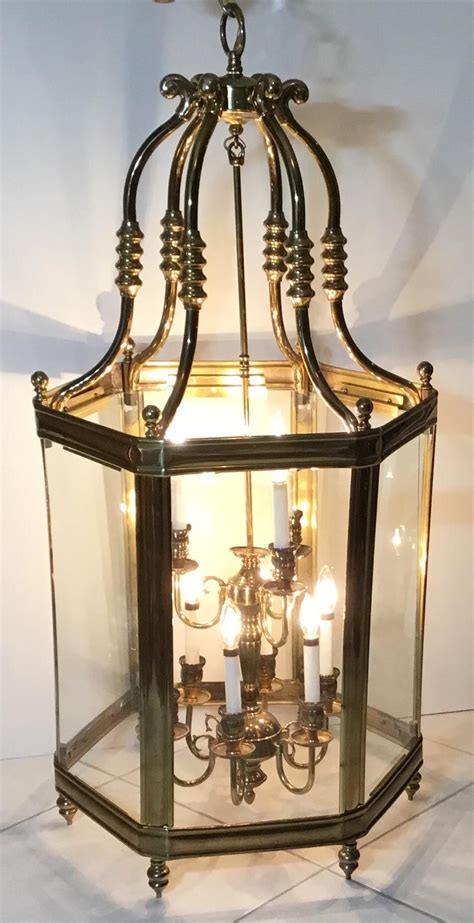 Flambeau designed mosaic 15 light large chandelier is a sparkling masterpiece when placed as a focal point in your space. Large Brass Hanging Chandelier Or Lantern For Sale at 1stdibs