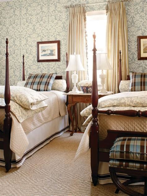 Bedroom with twin beds, black and white photography, and matching mirrors. Eye For Design: Decorating With Grown-Up Twin Beds