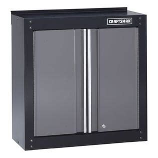 Modeled after a clock, this cabinet piece fits well in almost any tight, vertical space. Craftsman 28" Wide Wall Cabinet - Black/Platinum
