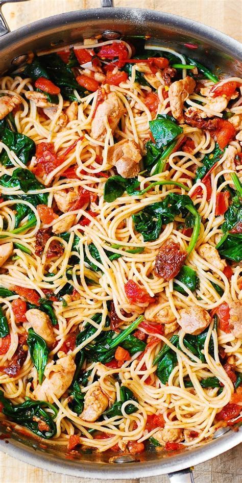 Tired of the same old pasta sauce over spaghetti? TOMATO SPINACH CHICKEN SPAGHETTI - Simply Delicious Dessert