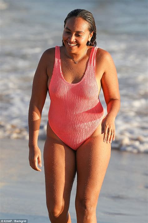 Lesbea trusting best friend for her first time. Jessica Mauboy in one-piece swimsuit at Bondi Beach ...