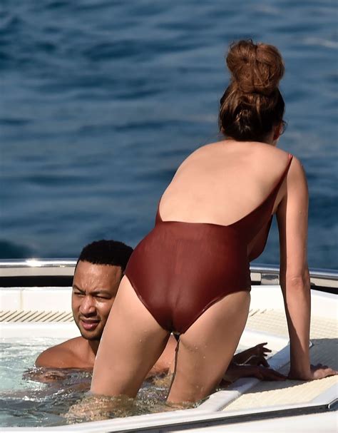 Introducing my new food baby 😩. CHRISSY TEIGEN in Swimsuit at a Boat in Portofino 07/02 ...