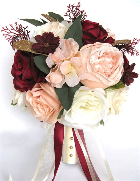 This wedding flower package is made with natural looking silk burgundy and gold roses and ivory baby's breaths. Wedding Bouquet 17 piece package Bridal Bouquets Silk ...