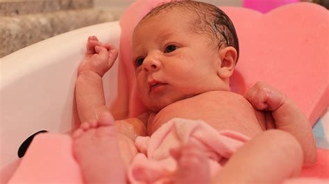 Pour bubble bath formula under the running water as you fill your tub. Newborn Baby's First Bath - YouTube