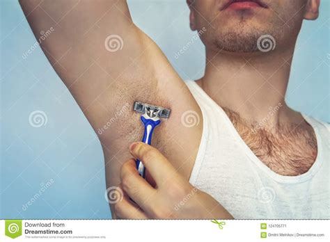 Benefits of underarm laser hair removal for men. Underarm Hair Removal. Male Depilation. Young Attractive ...