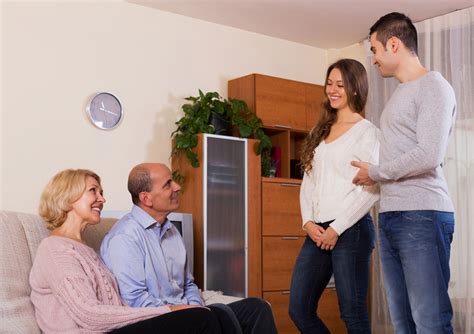 But above all, gentlemen, take your manners. parents meeting girlfriend of their son at home in the ...