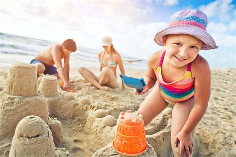 This search result page offers a collection of high quality beach pictures that can be downloaded and used for free, even for commercial purposes. Family Fun - Building Sand Castles | Traveler's Blog