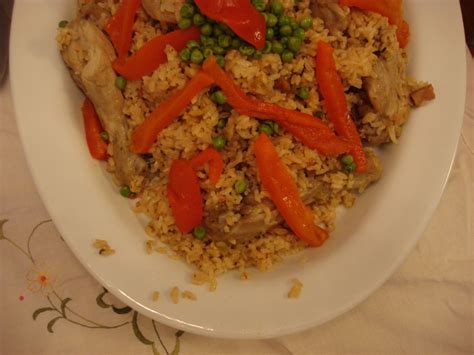 Puerto rican dishes incorporate different types of meat, garlic, olive oil, and rice. Arroz con pollo clásico (Puerto Rican Chicken and Rice ...