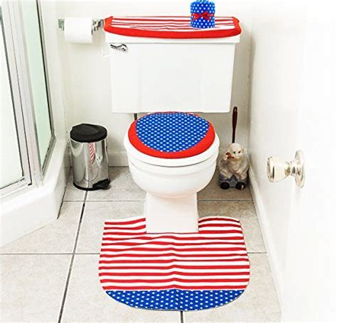 A moody bathroom makes a sophisticated design statement by combining dark fixtures like a toilet and vanity. USA Patriotic Home Decor | Blue bath rug, Bathroom decor sets