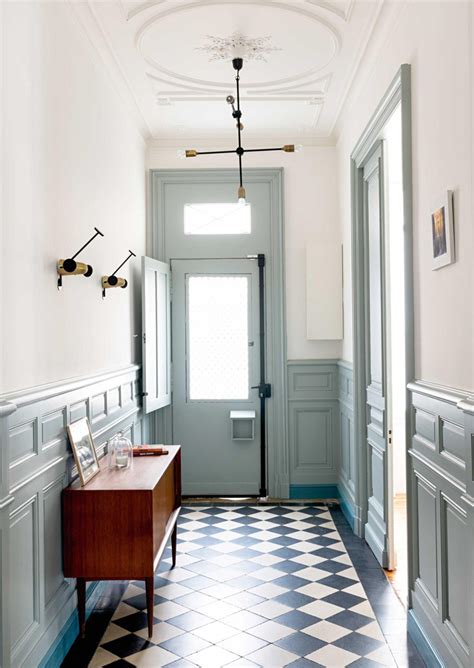 This front door pivots open into a light, bright hallway. Decorating Ideas For Stairs And Hallways - Apartment Number 4