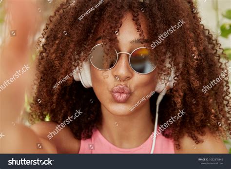 Cute & crazy african american hairstyles, haircuts, & hairdos with braids, twists, locks, afro, beads, natural hair, short hair, straight hair and curly hair for. Curling Afro Haircut : Curly Afro Natural Hair Styles ...