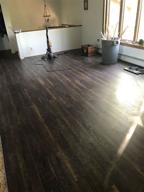 Coreluxe ultra 8mm old dominion walnut evp flooring. Living room floor. Color is called "old dominion walnut ...