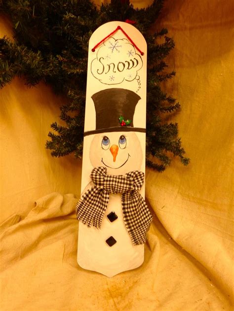 Let the boards dry and then apply a second coat of paint. Hand painted snowman wall or door hanging on a ceiling fan ...