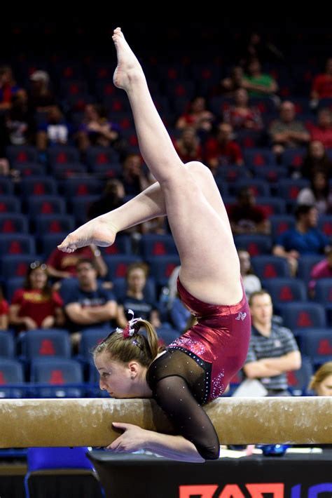 Also offering bespoke and customised leotards for your gymnastics team. University of Denver gymnast Leah Lomonte mounts the beam ...