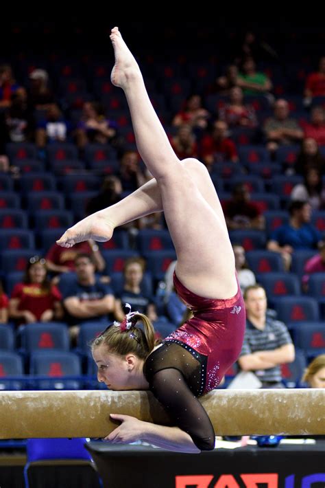 Show off your favorite photos and videos to the world. University of Denver gymnast Leah Lomonte mounts the beam ...