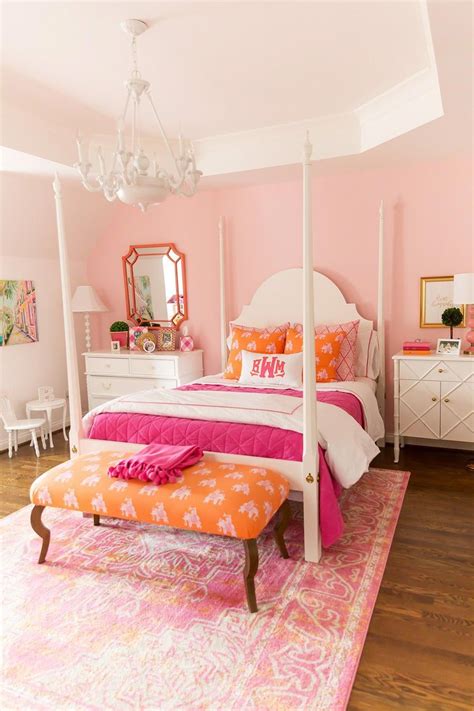 Pink bedrooms featuring blush bedroom accessories, pink accent walls, pink headboard walls, pink bed bases, pink bedroom chairs, benches, lamps, rugs pink decor is a hot topic right now and so we've put together a gorgeous collection of 101 of our favourite pink bedrooms and blush bedroom. Girl's pink and orange bedroom! #PinkAndGoldBedroomIdeas ...