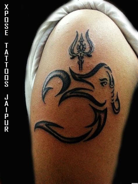 Om tattoo can be done with lord ganesha, trishul, lotus and many other designs. Pin by mr panchaaras on taitoos | Om tattoo design ...