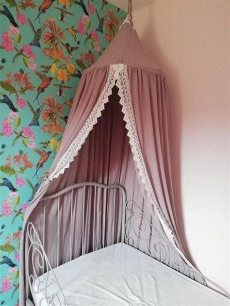 Starting with the 16th century, canopy beds got simpler designs and became plain and understated. Gray Canopy with white lace decor bed canopy canopy girls ...