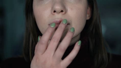 Recurring infections tend to be much milder, and the sores often erupt in the edges of the lips. herpes on the lips, part of a woman's face with finger on ...