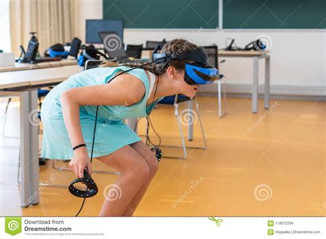 All models on this website are 18 years or older. Teen Girl Wearing VR Headset, Holding Controllers In Hands ...