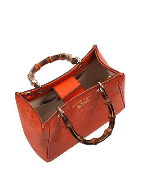 The realreal is the #1 luxury consignment online store. Gucci Bamboo Mini Leather Cross-body Bag in Orange - Lyst